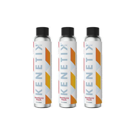 Three silver cylindrical bottles with black caps, labeled "KenetikPro Ketone Concentrate 3-Pack," are lined up against a white background, showcasing their natural ingredients and ketones designed to enhance cognitive benefits.